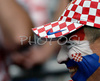 A Croatian fan smiles before the Euro 2008 Group B soccer match between Poland and Croatia at the Woerthersee stadium in Klagenfurt, Austria, Monday June 16, 2008.

