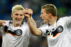 Germanys Bastian Schweinsteiger and Lukas Podolski celebrating during the Euro 2008 quarterfinals soccer match between Germany and Portugal on the St. Jakob-Park stadium in Basel, Switzerland, Thursday June 18, 2008.
