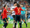 Spains Carlos Marchena, Carles Puyol and Germanys Michael Ballack during the Euro 2008 final soccer match between Spain and Germany at the Ernst Happel stadium in Vienna, Austria, Sunday June 29, 2008.
