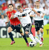 Lukas Podolski and Xavi Hernandez during the Euro 2008 final soccer match between Germany and Spain in the Ernst-Happel stadium in Vienna, Austria, Sunday, June 29, 2008.
