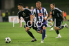 Patrick Ebert (no.20) of BSC Hertha (R) and Dejan Grabic (no.33) of NK Interblock (L) during football match of second qualifying round of UEFA Cup between NK Interblock Ljubljana, Slovenia and Hertha BSC Berlin, Germany. First match of second qualifying round for UEFA Cup was played in Petrol Arena in Celje, Slovenia, on 14th of August 2008.
