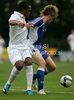 Henri Toivomaki of Finland (R) and Nathan Delfouneso of England (L) during football match of U19 UEFA European Championships Qualification tournament between England and Finland. Match between England and Finland was played in Murska Sobota, Slovenia, on 9th of October 2009.
