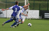 Juho Lahde of Finland (R) and Vladimir Kovac of Slovakia (L) during football match of U19 UEFA European Championships Qualification tournament between Slovakia and Finland. Match between Slovakia and Finland was played in Murska Sobota, Slovenia, on 11th of October 2009.
