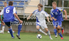 Roope Riski of Finland (R) and Marian Kolmokov of Slovakia (L) during football match of U19 UEFA European Championships Qualification tournament between Slovakia and Finland. Match between Slovakia and Finland was played in Murska Sobota, Slovenia, on 11th of October 2009.
