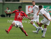 Matija Sirok of Slovenia (R) and Jacob Mellis of England (L) during football match of U19 UEFA European Championships Qualification tournament between Slovenia and England. Match between Slovenia and England was played in Murska Sobota, Slovenia, on 11th of October 2009.
