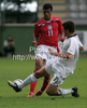 Jacob Mellis of England (L) and Nik Cimpric of Slovenia (R) during football match of U19 UEFA European Championships Qualification tournament between Slovenia and England. Match between Slovenia and England was played in Murska Sobota, Slovenia, on 11th of October 2009.
