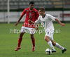 Luka Vrhunc of Slovenia (R) and Jacob Mellis of England (L) during football match of U19 UEFA European Championships Qualification tournament between Slovenia and England. Match between Slovenia and England was played in Murska Sobota, Slovenia, on 11th of October 2009.
