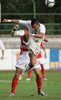 Lamin Diallo of Slovenia (front) and Steven Caulker of England (back) during football match of U19 UEFA European Championships Qualification tournament between Slovenia and England. Match between Slovenia and England was played in Murska Sobota, Slovenia, on 11th of October 2009.

