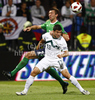 Bojan Jokic of Slovenia (front) and Gareth McAuley of Northern Ireland (back) during football match of first round of UEFA European championships qualifications between Slovenia and Northern Ireland. Match between Slovenia and Northern Ireland was played on Friday, 3rd of September 2010 in Ljudski Vrt arena in Maribor, Slovenia.
