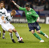 Kyle Lafferty of Northern Ireland (R) and Miso Brecko of Slovenia (L) during football match of first round of UEFA European championships qualifications between Slovenia and Northern Ireland. Match between Slovenia and Northern Ireland was played on Friday, 3rd of September 2010 in Ljudski Vrt arena in Maribor, Slovenia.
