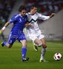 Jonas Tor Naes of Faroe Islands (L) and Josip Ilicic of Slovenia (R) during football match of UEFA European championships qualifications between Slovenia and Faroe Islands. Match between Slovenia and Faroe Islands was played on Friday, 8th of October 2010 in Stozice arena in Ljubljana, Slovenia.
