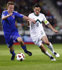 Daniel Udsen of Faroe Islands (L) and Robert Koren of Slovenia (R) during football match of UEFA European championships qualifications between Slovenia and Faroe Islands. Match between Slovenia and Faroe Islands was played on Friday, 8th of October 2010 in Stozice arena in Ljubljana, Slovenia.
