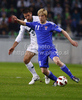 Joan Edmundsson of Faroe Islands (R) and Bostjan Cesar of Slovenia (L) during football match of UEFA European championships qualifications between Slovenia and Faroe Islands. Match between Slovenia and Faroe Islands was played on Friday, 8th of October 2010 in Stozice arena in Ljubljana, Slovenia.
