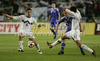 Robert Koren of Slovenia (L), Daniel Udsen of Faroe Islands and Aleksander Radosavljevic of Slovenia during football match of UEFA European championships qualifications between Slovenia and Faroe Islands. Match between Slovenia and Faroe Islands was played on Friday, 8th of October 2010 in Stozice arena in Ljubljana, Slovenia.
