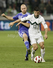 Christian Holst of Faroe Islands (L) and Bojan Jokic of Slovenia during football match of UEFA European championships qualifications between Slovenia and Faroe Islands. Match between Slovenia and Faroe Islands was played on Friday, 8th of October 2010 in Stozice arena in Ljubljana, Slovenia.

