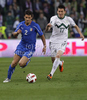 Davide Santon of Italy (L) and Andraz Kirm of Slovenia (R) during football match of UEFA European championships qualifications between Slovenia and Italy. Match between Slovenia and Italy was played on Friday, 25th of March 2011 in Stozice arena in Ljubljana, Slovenia.
