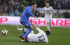 Giampaolo Pazzini of Italy (L) and Bojan Jokic of Slovenia (R) during football match of UEFA European championships qualifications between Slovenia and Italy. Match between Slovenia and Italy was played on Friday, 25th of March 2011 in Stozice arena in Ljubljana, Slovenia.
