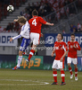 Teemu Pukki (no.10) of Finland (L) and Franz Schiemer (no.4) of Austria (R) jumping for ball during friendly football match between Austria and Finland. Friendly football match between Austria and Finland, was played on Wednesday, 29th of February 2012, on Worthersee Stadium in Klagenfurt, Austria.
