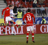 Veli Lampi (no.5) of Finland (R) and Andreas Ivanschitz (no.25) of Austria (L) during friendly football match between Austria and Finland. Friendly football match between Austria and Finland, was played on Wednesday, 29th of February 2012, on Worthersee Stadium in Klagenfurt, Austria.
