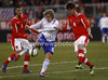 Teemu Pukki (no.10) of Finland (M) between  Aleksandar Dragovic (no.3) of Austria (L) and Franz Schiemer (no.4) of Austria (R) during friendly football match between Austria and Finland. Friendly football match between Austria and Finland, was played on Wednesday, 29th of February 2012, on Worthersee Stadium in Klagenfurt, Austria.
