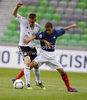 Nico Brandenburger of Germany (L) and Mohamed Chemlal of France (R) during football match between Germany and France of UEFA U17 European championships. UEFA U17 European championships football match between Germany and France, was played on Thursday, 10th of May 2012, in Stozice Stadium in Ljubljana, Slovenia.
