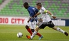 Thomas Lemar of France (L) and Pascal Itter of Germany (R) during football match between Germany and France of UEFA U17 European championships. UEFA U17 European championships football match between Germany and France, was played on Thursday, 10th of May 2012, in Stozice Stadium in Ljubljana, Slovenia.
