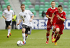 Marc Stendera of Germany (L), Vincent Rabiega of Poland (M) and Rafal Wlodarczyk of Poland (R) during football half final match of UEFA U17 European championships between Germany and Poland. Half final match of UEFA U17 European championships football between Germany and Poland, was played on Sunday, 13th of May 2012, in Stozice Stadium in Ljubljana, Slovenia.
