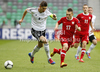 Marc Stendera of Germany (L) and Rafal Wlodarczyk of Poland (R) during football half final match of UEFA U17 European championships between Germany and Poland. Half final match of UEFA U17 European championships football between Germany and Poland, was played on Sunday, 13th of May 2012, in Stozice Stadium in Ljubljana, Slovenia.
