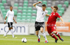 Leon Goretzka of Germany (L) and Karol Linetty of Poland (R) during football half final match of UEFA U17 European championships between Germany and Poland. Half final match of UEFA U17 European championships football between Germany and Poland, was played on Sunday, 13th of May 2012, in Stozice Stadium in Ljubljana, Slovenia.
