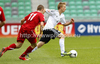 Nico Brandenburger of Germany (R) and Vincent Rabiega of Poland (L) during football half final match of UEFA U17 European championships between Germany and Poland. Half final match of UEFA U17 European championships football between Germany and Poland, was played on Sunday, 13th of May 2012, in Stozice Stadium in Ljubljana, Slovenia.

