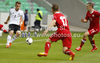 Pascal Itter of Germany (L), Rafal Wlodarczyk of Poland (M) and Vincent Rabiega of Poland (R) during football half final match of UEFA U17 European championships between Germany and Poland. Half final match of UEFA U17 European championships football between Germany and Poland, was played on Sunday, 13th of May 2012, in Stozice Stadium in Ljubljana, Slovenia.
