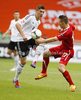 Leon Goretzka of Germany (L) and Rafal Wlodarczyk of Poland (R) during football half final match of UEFA U17 European championships between Germany and Poland. Half final match of UEFA U17 European championships football between Germany and Poland, was played on Sunday, 13th of May 2012, in Stozice Stadium in Ljubljana, Slovenia.
