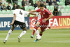 Mariusz Stepinski of Poland (R) and Marian Sarr of Germany (L) during football half final match of UEFA U17 European championships between Germany and Poland. Half final match of UEFA U17 European championships football between Germany and Poland, was played on Sunday, 13th of May 2012, in Stozice Stadium in Ljubljana, Slovenia.
