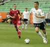 Niklas Sule of Germany (R) and Vincent Rabiega of Poland (L) during football half final match of UEFA U17 European championships between Germany and Poland. Half final match of UEFA U17 European championships football between Germany and Poland, was played on Sunday, 13th of May 2012, in Stozice Stadium in Ljubljana, Slovenia.
