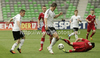 Mariusz Stepinski of Poland is tackled down during football half final match of UEFA U17 European championships between Germany and Poland. Half final match of UEFA U17 European championships football between Germany and Poland, was played on Sunday, 13th of May 2012, in Stozice Stadium in Ljubljana, Slovenia.
