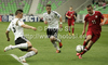 Vincent Rabiega of Poland (R) Pascal Itter of Germany (M) and Niklas Sule of Germany (L) during football half final match of UEFA U17 European championships between Germany and Poland. Half final match of UEFA U17 European championships football between Germany and Poland, was played on Sunday, 13th of May 2012, in Stozice Stadium in Ljubljana, Slovenia.
