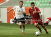 Karol Linetty of Poland (R) and Pascal Itter of Germany (L) during football half final match of UEFA U17 European championships between Germany and Poland. Half final match of UEFA U17 European championships football between Germany and Poland, was played on Sunday, 13th of May 2012, in Stozice Stadium in Ljubljana, Slovenia.
