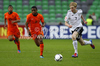 Julian Brandt of Germany (R), Djavan Anderson of Netherlands (M) and Tonny Trindade de Vilhena of Netherlands (L) during football final match of UEFA U17 European championships between Germany and Netherlands. Final match of UEFA U17 European championships football between Germany and Netherlands, was played on Wednesday, 16th of May 2012, in Stozice Stadium in Ljubljana, Slovenia.
