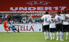 Pascal Huser of Netherlands shooting penalty shoot while German players are observing him after football final match of UEFA U17 European championships between Germany and Netherlands ended with tie in regular time . Final match of UEFA U17 European championships football between Germany and Netherlands, was played on Wednesday, 16th of May 2012, in Stozice Stadium in Ljubljana, Slovenia.

