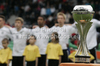 European championships victory trophy with German team in background before start of football final match of UEFA U17 European championships between Germany and Netherlands. Final match of UEFA U17 European championships football between Germany and Netherlands, was played on Wednesday, 16th of May 2012, in Stozice Stadium in Ljubljana, Slovenia.
