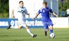 Rasmus Schuller of Finland (R) and Blaz Bozic of Slovenia (L) during football match of UEFA U21 European championships 2013 qualifications between Slovenia and Finland. Qualifications match for UEFA U21 European championships 2013 between Slovenia and Finland, was played on Tuesday, 5th of June 2012, in Ptuj city Stadium in Ptuj, Slovenia.
