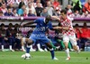 Mario Balotelli of Italy and Ivan Perisic of Croatia during UEFA Football Euro 2012 match between Italy and Croatia. Match of UEFA Football European Championships 2012 between Italy and Croatia was played on Thursday, 14th of June 2012 in Poznan, Poland.
