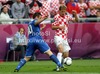 Ivan Strinic of Croatia and Antonio Cassano of Italy during UEFA Football Euro 2012 match between Italy and Croatia. Match of UEFA Football European Championships 2012 between Italy and Croatia was played on Thursday, 14th of June 2012 in Poznan, Poland.

