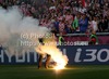 Croatian fans throwing fire torches to field during UEFA Football Euro 2012 match between Italy and Croatia. Match of UEFA Football European Championships 2012 between Italy and Croatia was played on Thursday, 14th of June 2012 in Poznan, Poland.
