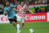 Luka Modric of Croatia, Sergio Busquets of Spain during UEFA Football Euro 2012 match between Croatia and Spain. Match of UEFA Football European Championships 2012 between Croatia and Spain was played on Monday, 18th of June 2012 in Gdansk, Poland.
