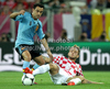 Xavi Hernandez of Spain, Ivan Rakitic of Croatia during UEFA Football Euro 2012 match between Croatia and Spain. Match of UEFA Football European Championships 2012 between Croatia and Spain was played on Monday, 18th of June 2012 in Gdansk, Poland.
