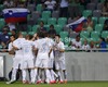 Players of Slovenia celebrating goal of Bostjan Cesar in front of home crowd during friendly football match between Slovenia and Romania. Match between Slovenia and Romania was played in Stozice arena in Ljubljana, Slovenia, on Wednesday, 15th of August 2012.
