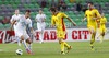 Zlatko Dedic (no.14) of Slovenia (L) and Costin Lazar (no.8) of Romania (R) during friendly football match between Slovenia and Romania. Match between Slovenia and Romania was played in Stozice arena in Ljubljana, Slovenia, on Wednesday, 15th of August 2012.
