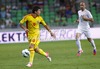 Cristian Tanase (no.10) of Romania (L) and Miso Brecko (no.2) of Slovenia (R) during friendly football match between Slovenia and Romania. Match between Slovenia and Romania was played in Stozice arena in Ljubljana, Slovenia, on Wednesday, 15th of August 2012.
