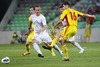 Jasmin Kurtic (no.8) of Slovenia (L) and Razvan Cocis (no.16) of Romania (R) during friendly football match between Slovenia and Romania. Match between Slovenia and Romania was played in Stozice arena in Ljubljana, Slovenia, on Wednesday, 15th of August 2012.
